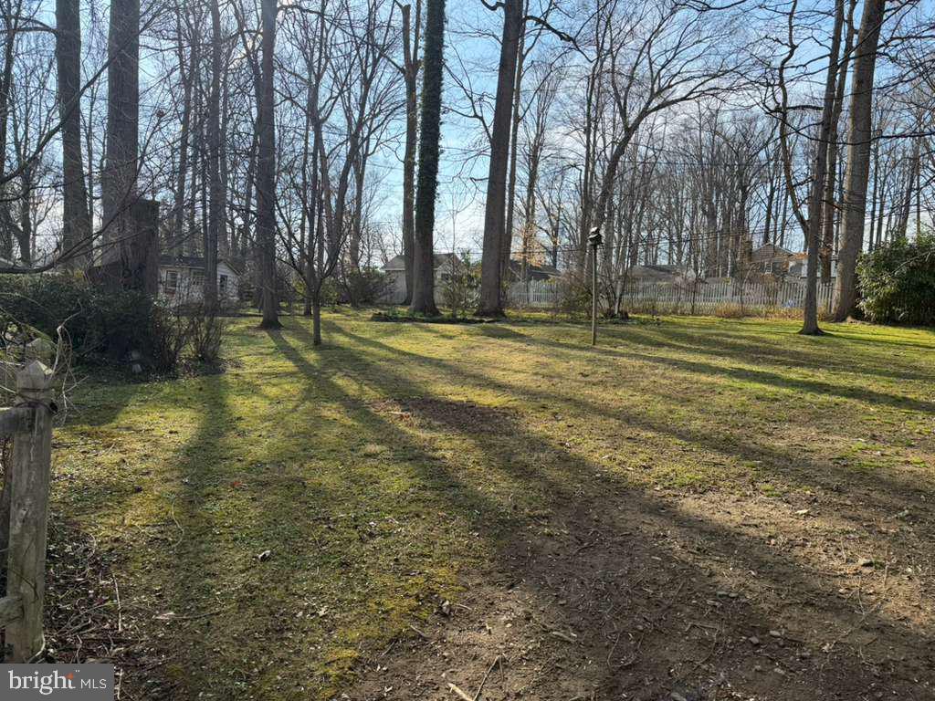 1268 Rydal Road Jenkintown, PA 19046 - Photo 50 of 59 a swimming pool with trees in the background