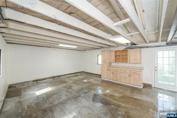 a picture of a room with a lot of white walls