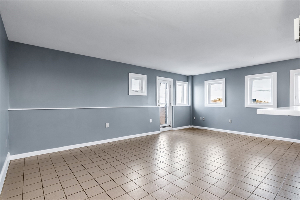 165 Cottage Street, Unit 711 Chelsea, MA 02150 - Photo 15 of 39 a view of an empty room with window