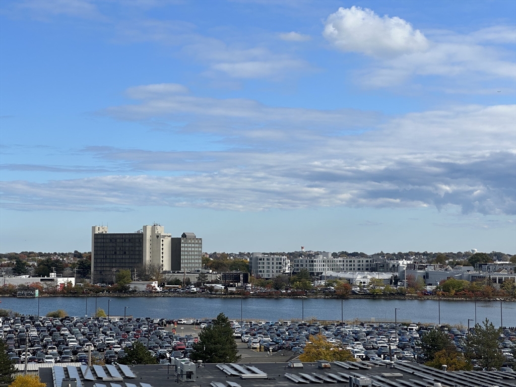 165 Cottage Street, Unit 711 Chelsea, MA 02150 - Photo 38 of 39 a city view with tall buildings