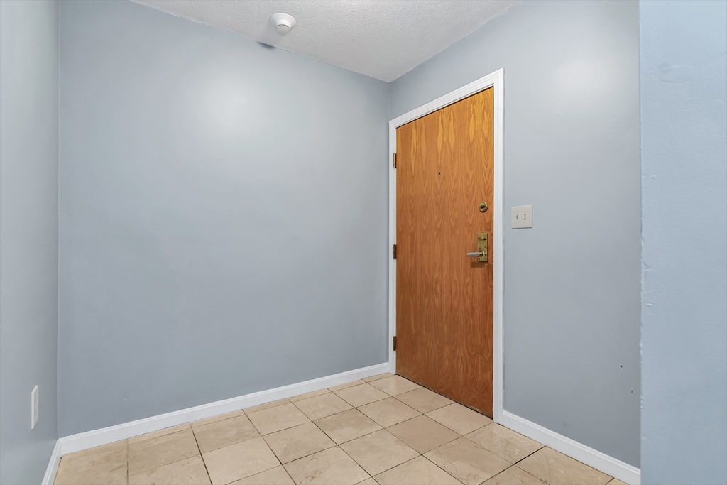 165 Cottage Street, Unit 711 Chelsea, MA 02150 - Photo 5 of 39 a view of an empty room