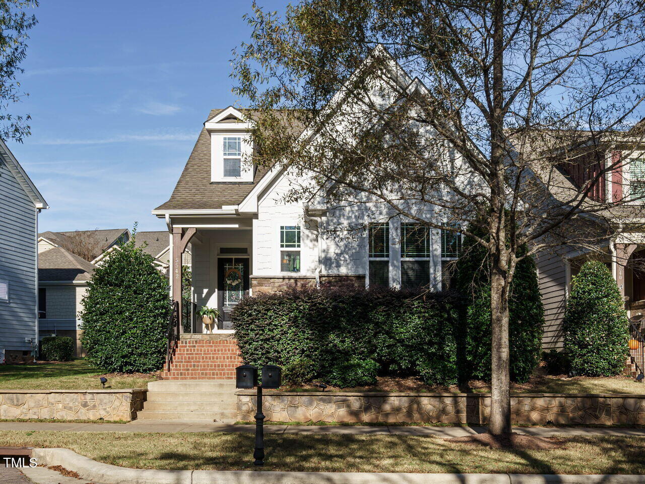 5542 Wade Park Boulevard Raleigh, NC 27607 - Photo 1 of 32 a front view of a house with trees