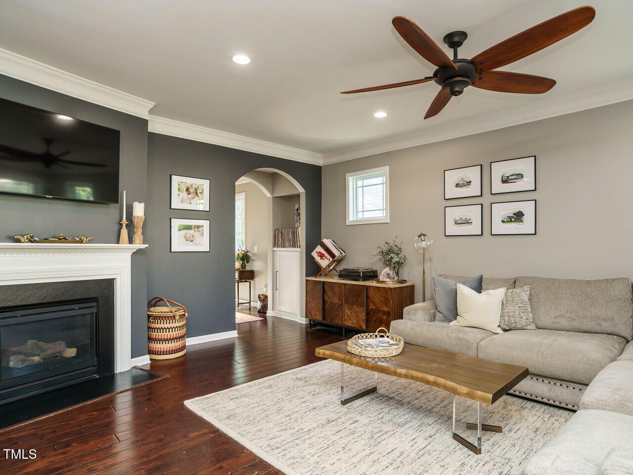 5542 Wade Park Boulevard Raleigh, NC 27607 - Photo 8 of 32 a living room with furniture and a fireplace