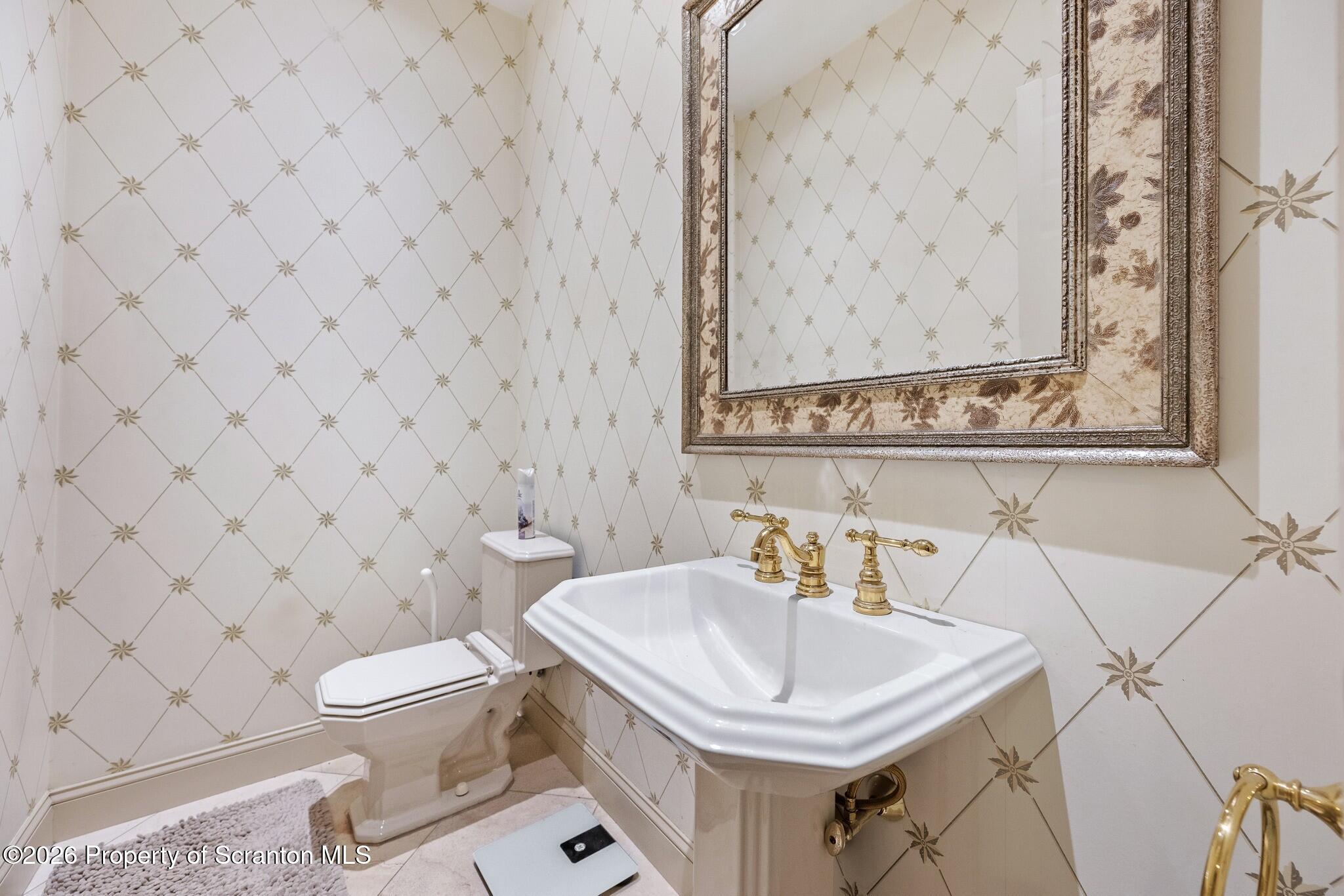 833 Laurel Road Mayfield, PA 18433 - Photo 44 of 67 Half bathroom on main level