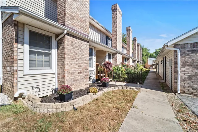 a view of a building with sitting area