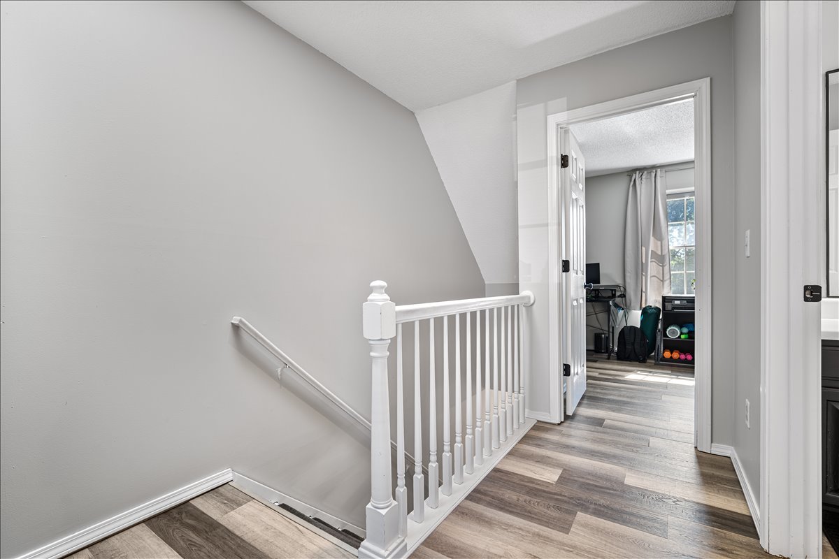 903 North Linden Street, Unit 232 Normal, IL 61761 - Photo 21 of 25 a view of a hallway view with staircase
