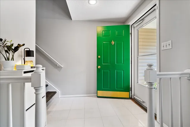 a view of an entryway with staircase