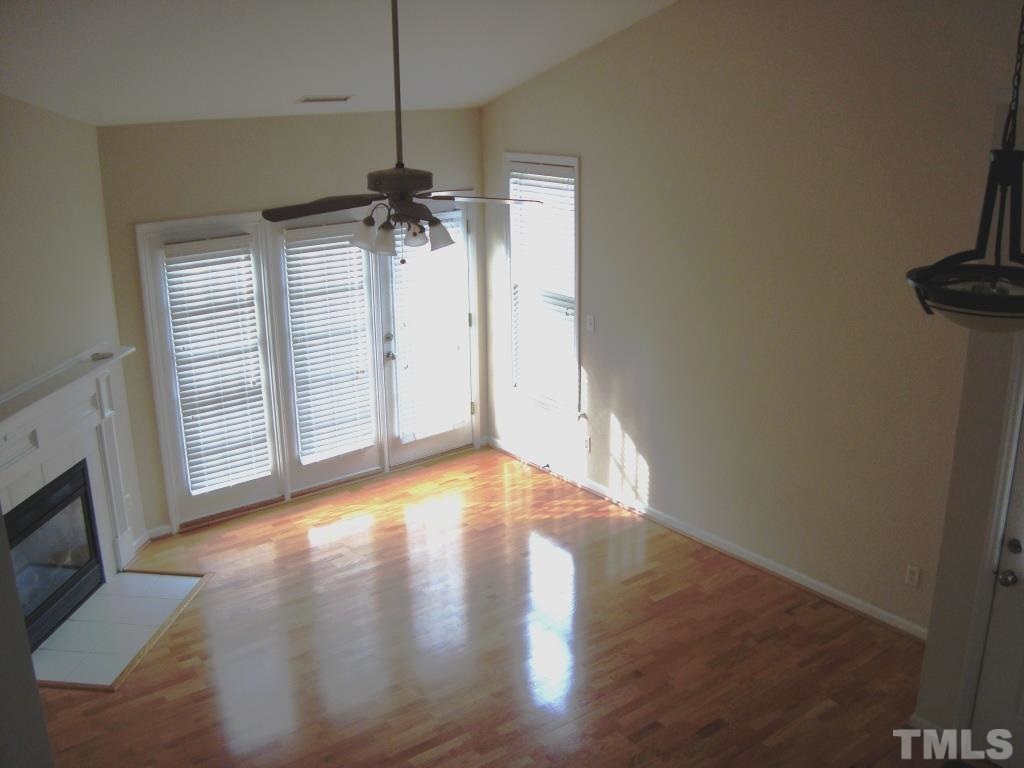 11035 Louson Place Raleigh, NC 27614 - Photo 12 of 24 Living room showing the access to the deck!