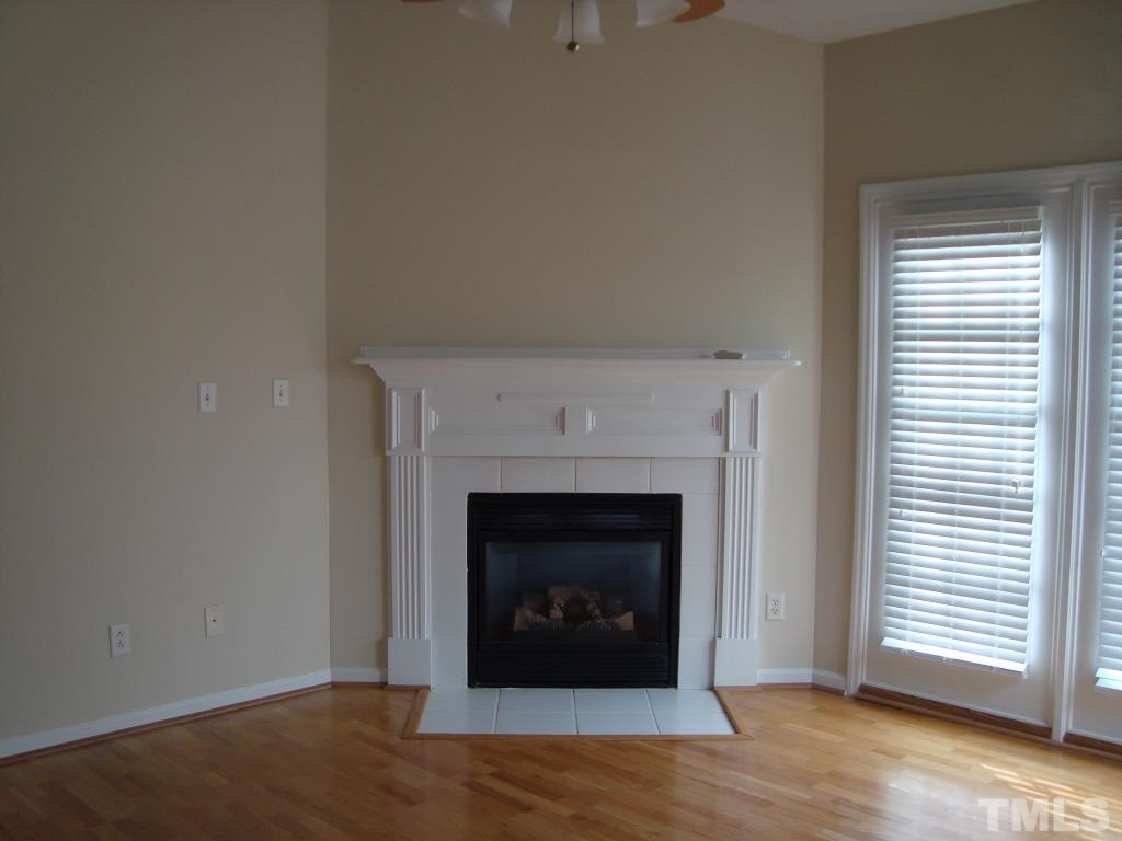 11035 Louson Place Raleigh, NC 27614 - Photo 14 of 24 Gas log fireplace-just turn on the switch and instant fire!