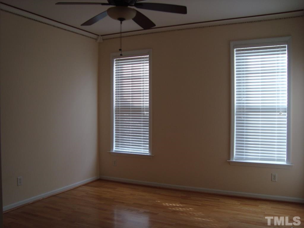 11035 Louson Place Raleigh, NC 27614 - Photo 15 of 24 Large master with wood floors and ceiling fan!