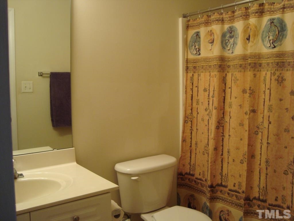 11035 Louson Place Raleigh, NC 27614 - Photo 19 of 24 Second floor bath is light and neutral!