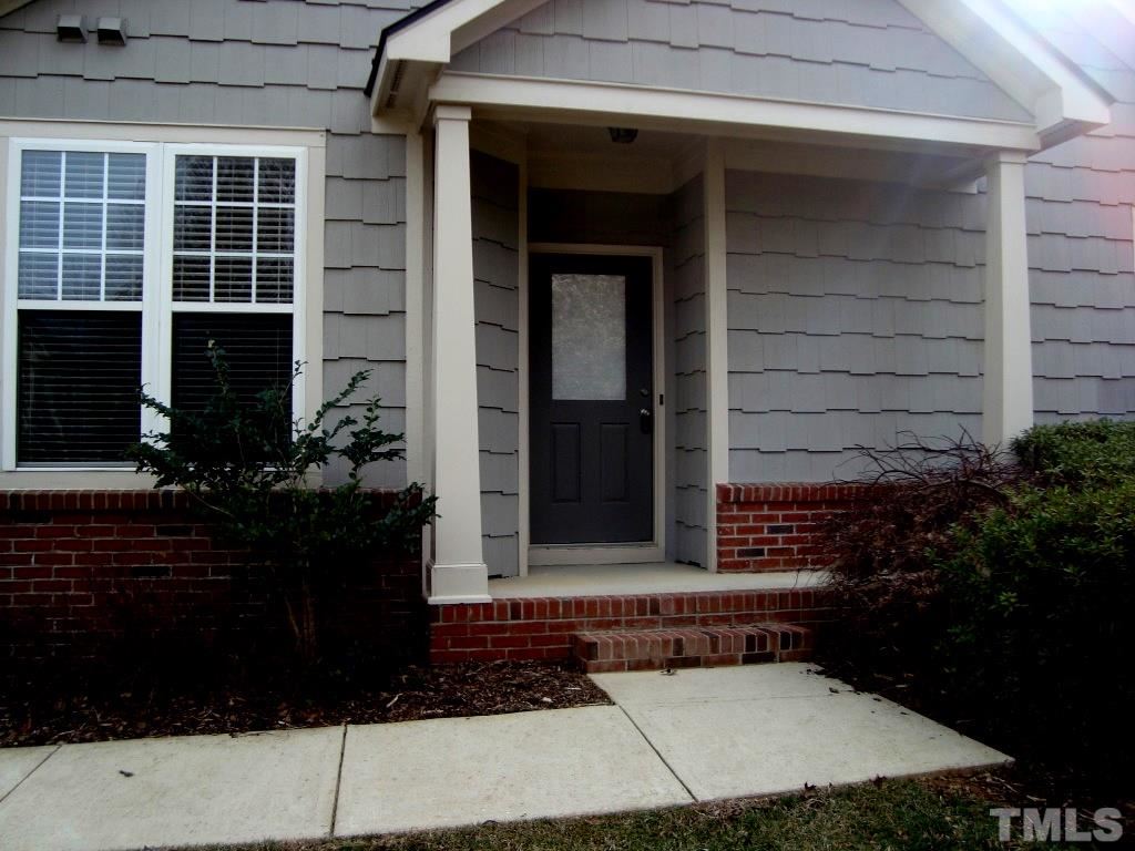 11035 Louson Place Raleigh, NC 27614 - Photo 3 of 24 This town home has a private side entrance with overhang/porch!