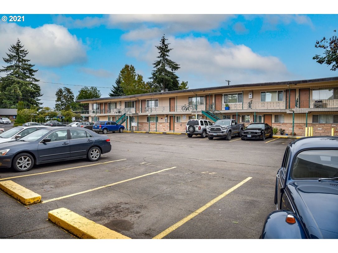310 Mill Street Springfield, OR 97477 - Photo 5 of 9 a view of a cars park in front of house