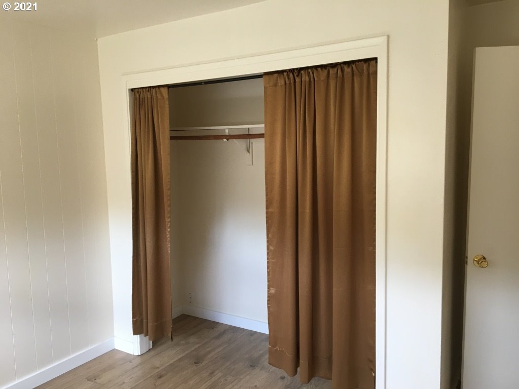 310 Mill Street Springfield, OR 97477 - Photo 8 of 9 a view of walk in closet with empty room