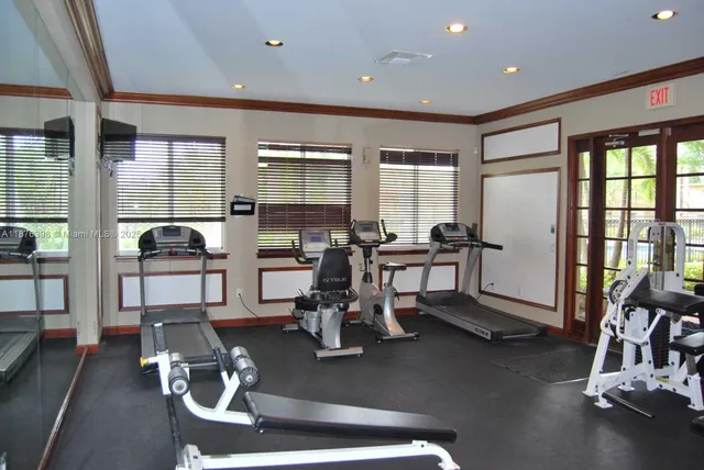 a view of a porch with potted plants