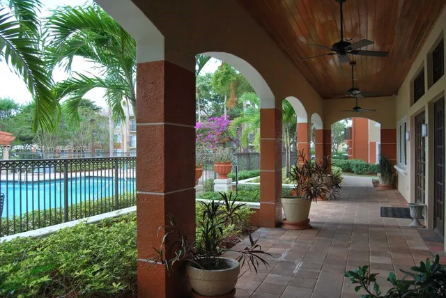 a garden view with a seating space