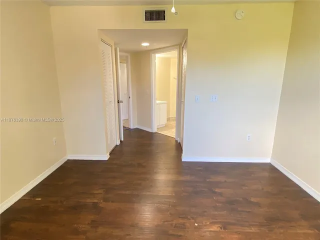 a bathroom with a toilet sink and shower
