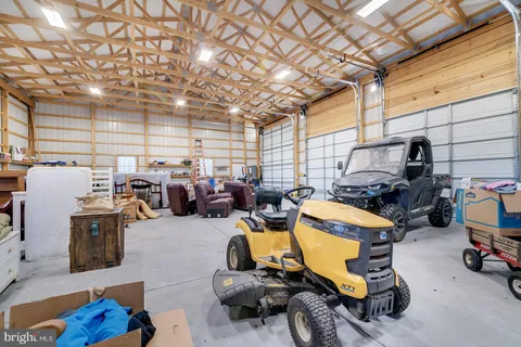 a view of house with wooden floor and a sink