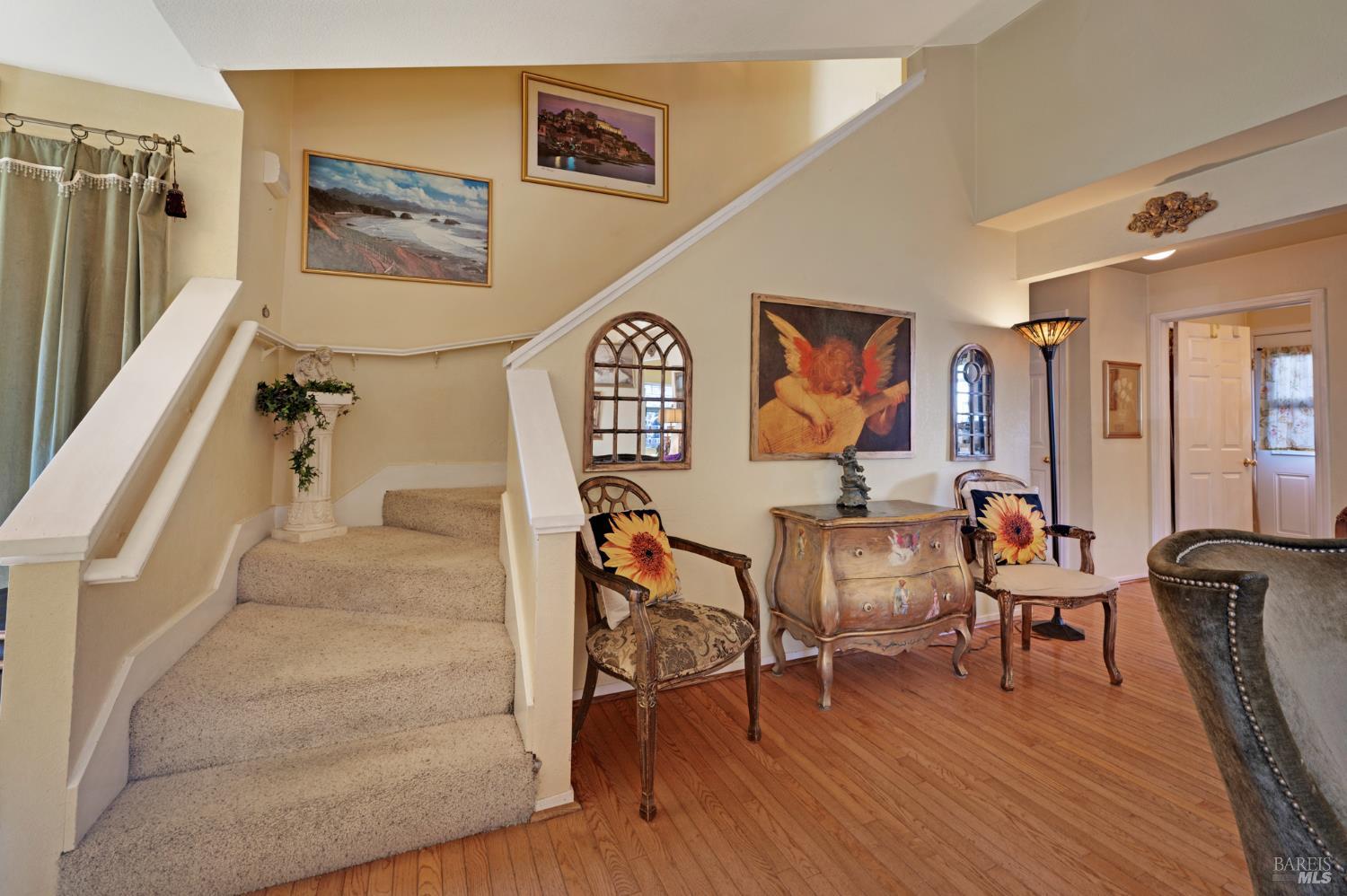 1905 Belair Way Santa Rosa, CA 95403 - Photo 13 of 27 a view of a hallway with wooden floor and furniture
