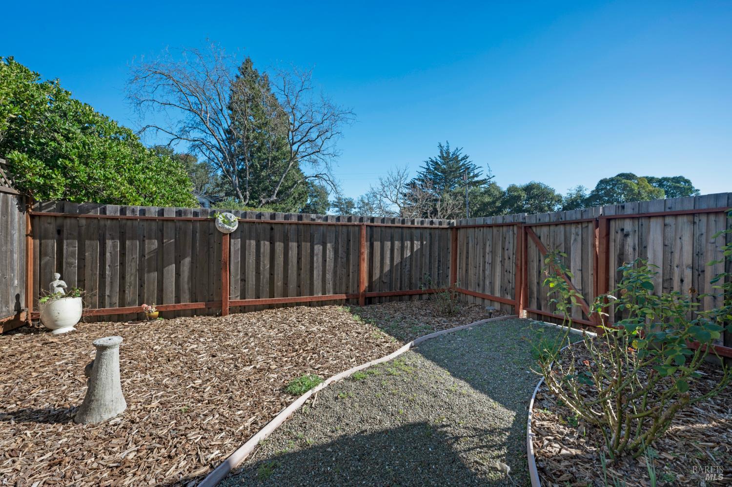1905 Belair Way Santa Rosa, CA 95403 - Photo 25 of 27 a backyard of a house with table and chairs