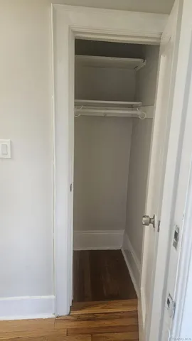 a bathroom with a glass door