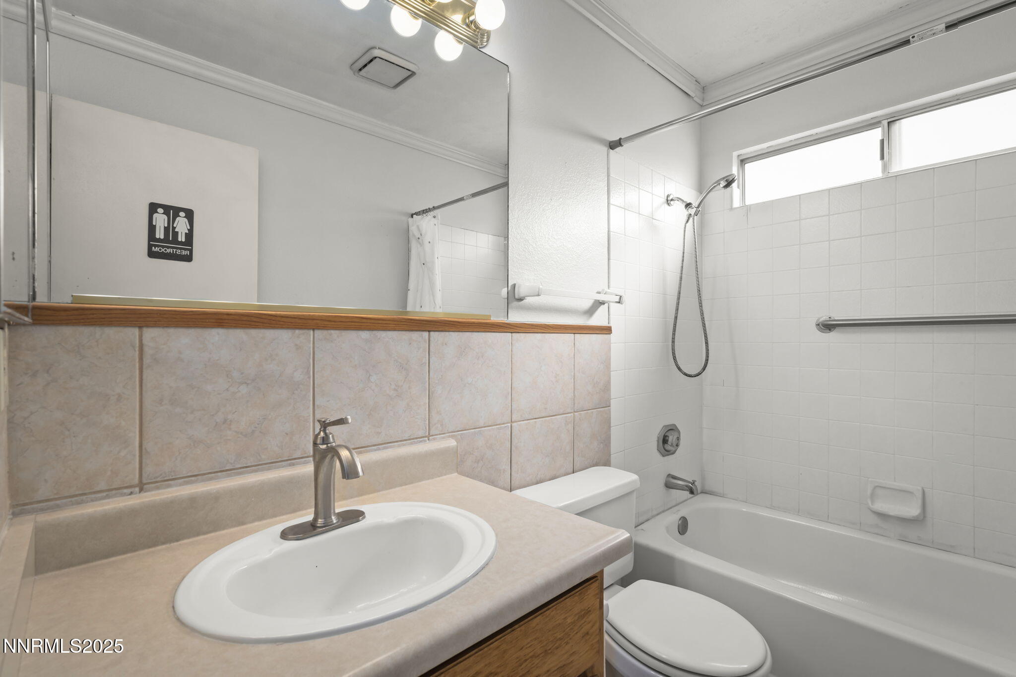 1720 Peavine Road Reno, NV 89503 - Photo 17 of 24 a bathroom with a sink and a mirror