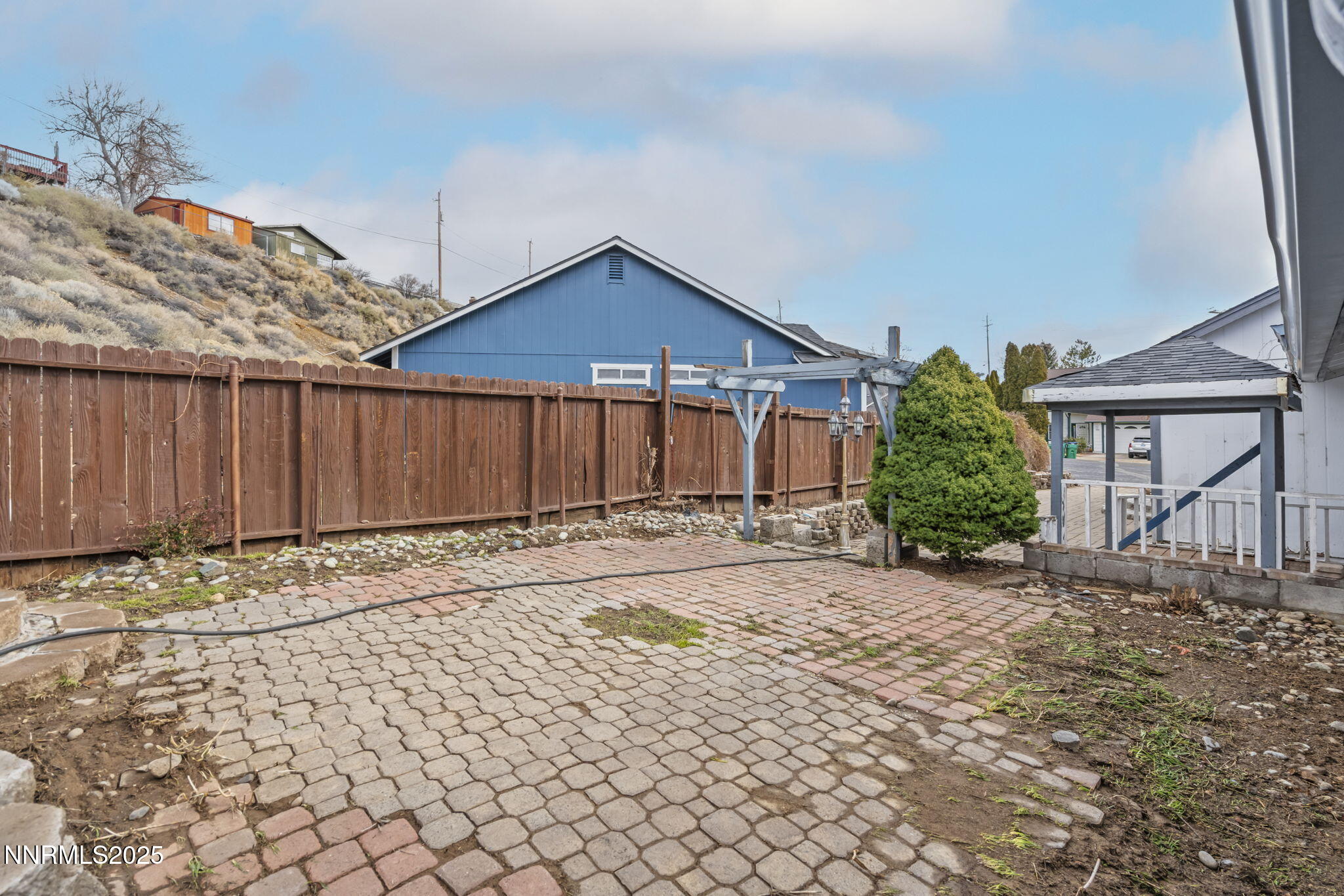 1720 Peavine Road Reno, NV 89503 - Photo 18 of 24 a front view of a house with a yard