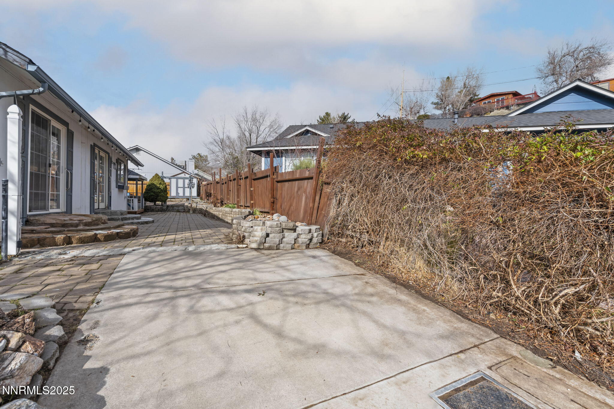 1720 Peavine Road Reno, NV 89503 - Photo 22 of 24 a view of a house with a snow on the road