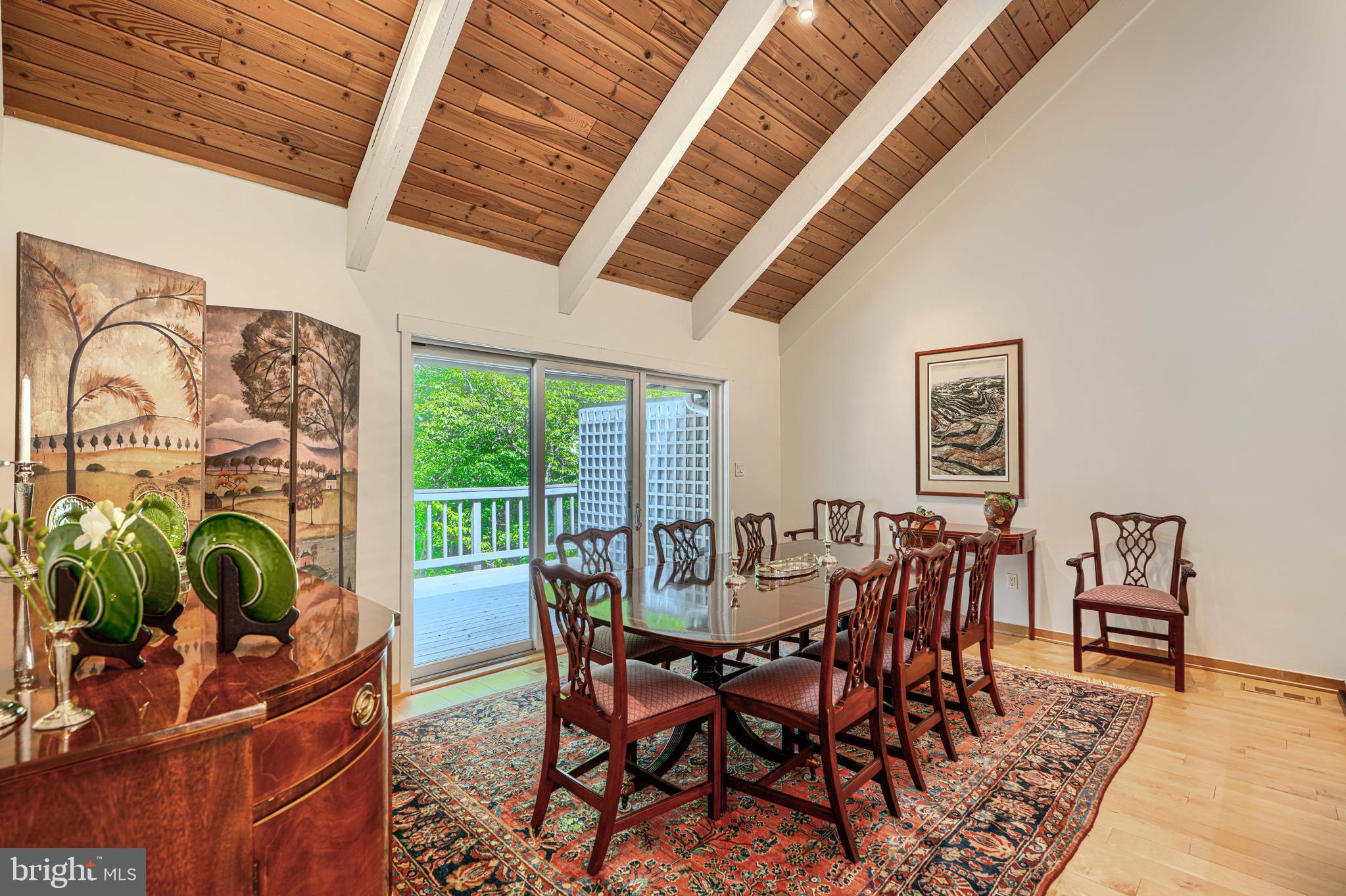 2504 Stone Mill Road Baltimore, MD 21208 - Photo 5 of 123 Vaulted ceiings, dining area with sliders to deck
