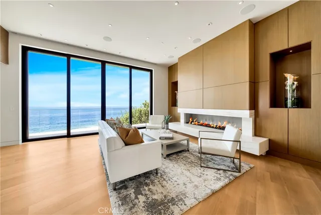 a view of a balcony with wooden floor and outdoor space
