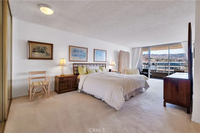 a view of house with backyard and garden