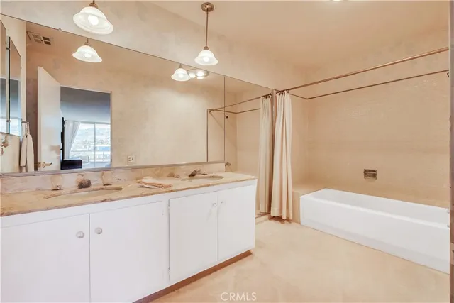 a view of a chairs and table on the terrace