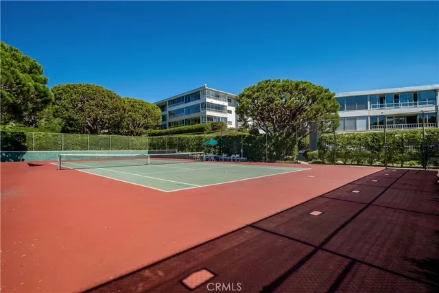 an aerial view of a house with a ocean view