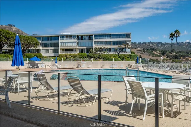 an aerial view of a house with a ocean view