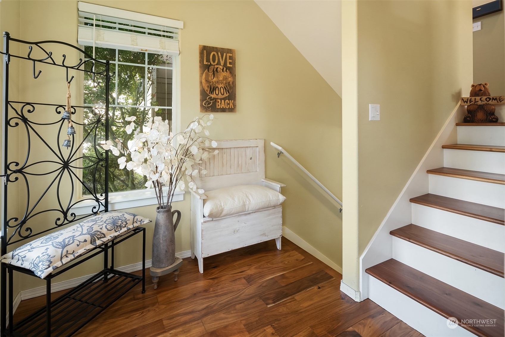 15 164th Street Southwest, Unit H4 Bothell, WA 98012 - Photo 2 of 18 a living room with furniture and wooden floor