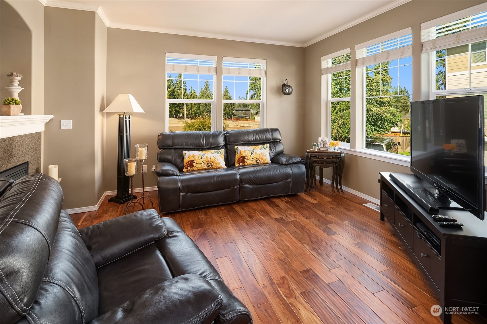 15 164th Street Southwest, Unit H4 Bothell, WA 98012 - Photo 8 of 18 a living room with furniture and a flat screen tv