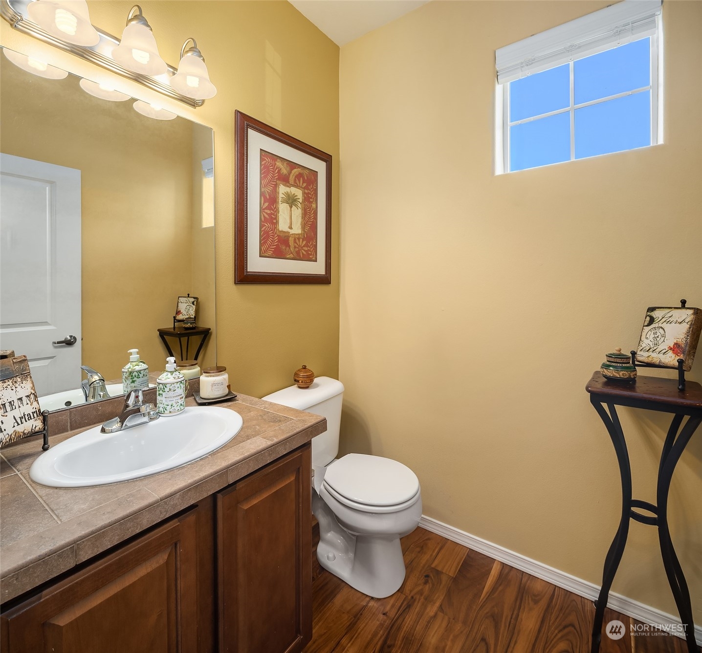 15 164th Street Southwest, Unit H4 Bothell, WA 98012 - Photo 10 of 18 a bathroom with a sink a toilet and mirror