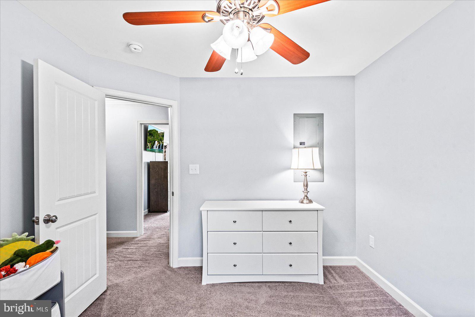 129 Brooks Drive Colonial Beach, VA 22443 - Photo 26 of 40 a bathroom with a sink a mirror and a vanity