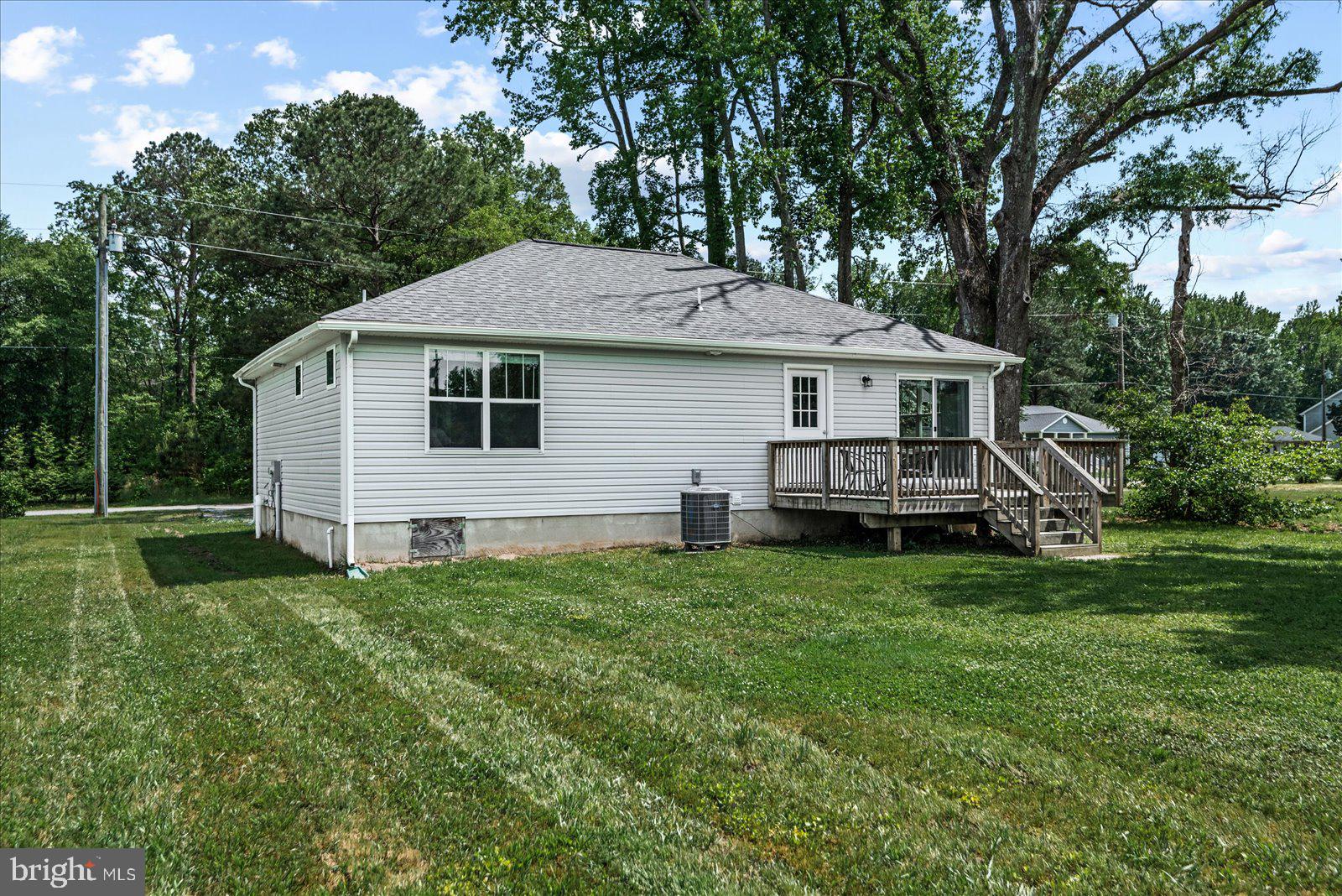 129 Brooks Drive Colonial Beach, VA 22443 - Photo 31 of 40 a view of a house with a yard