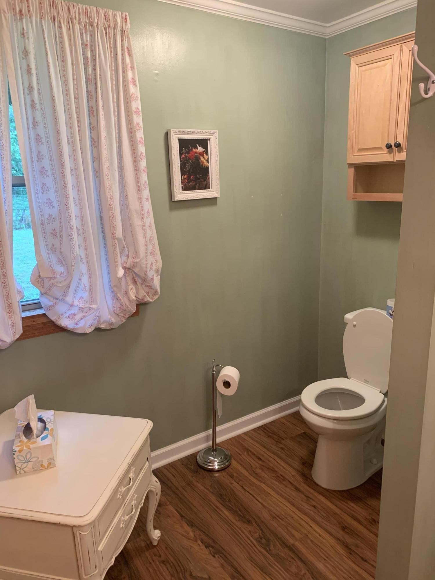 10017 Rutledge Pike Corryton, TN 37721 - Photo 11 of 38 a bathroom with a sink and a toilet