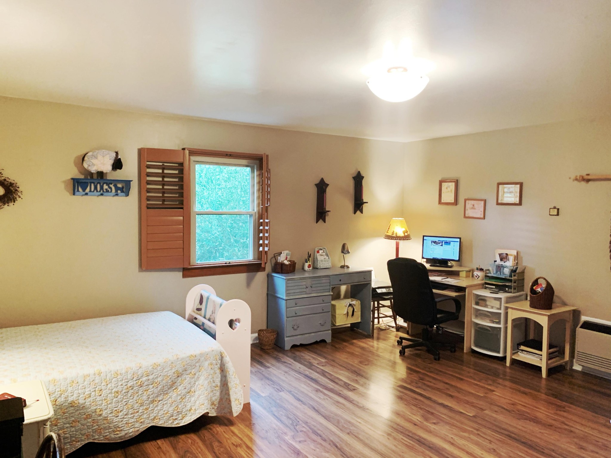 10017 Rutledge Pike Corryton, TN 37721 - Photo 8 of 38 a bedroom with a bed and a wooden floor