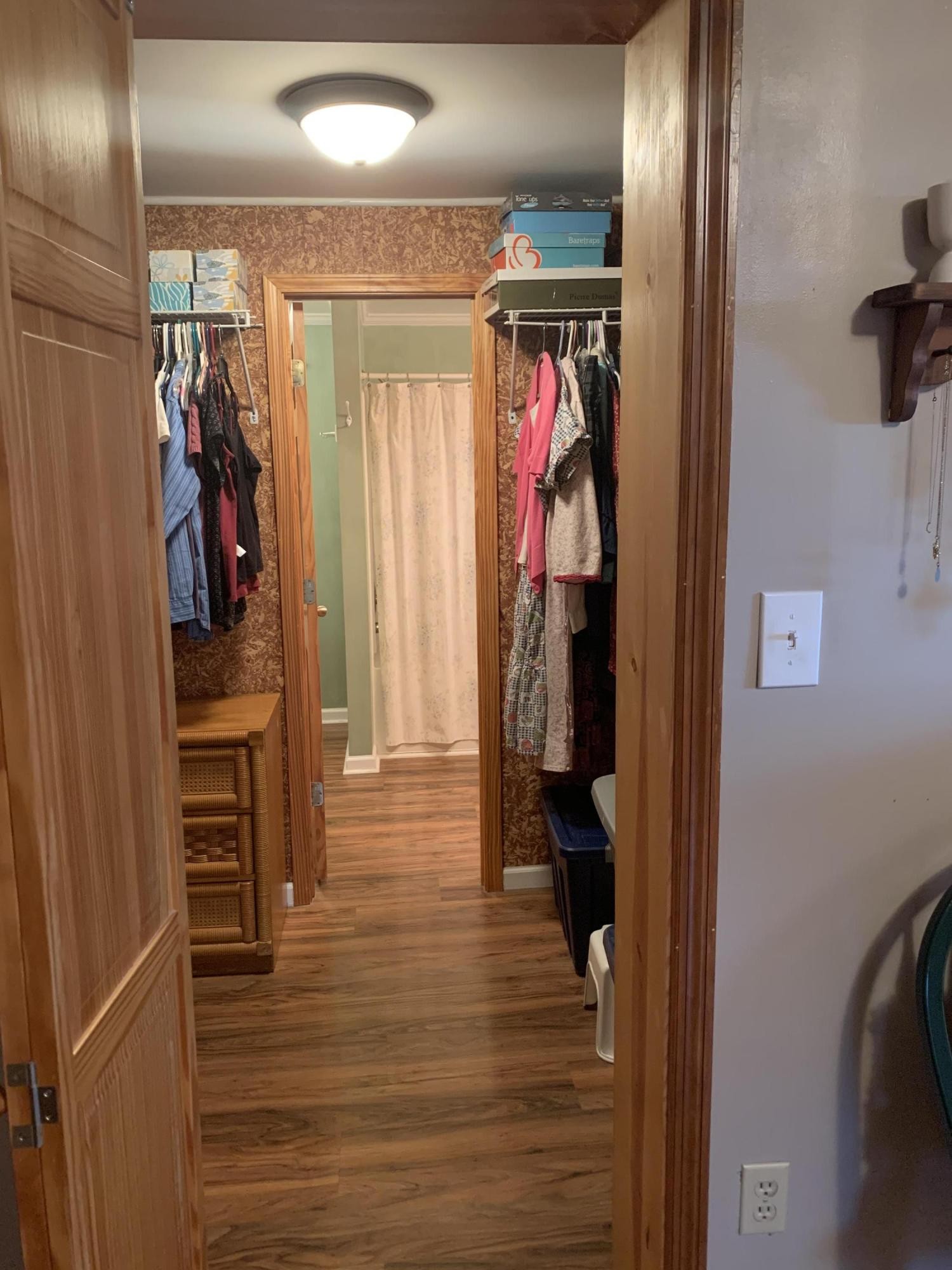 10017 Rutledge Pike Corryton, TN 37721 - Photo 9 of 38 a view of walk in closet with clothes and shoes