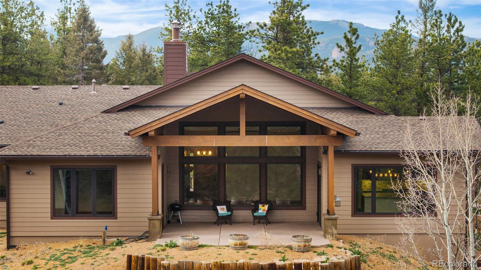 280 Double Tree Road Bailey, CO 80421 - Photo 40 of 43 a view of a house with a yard