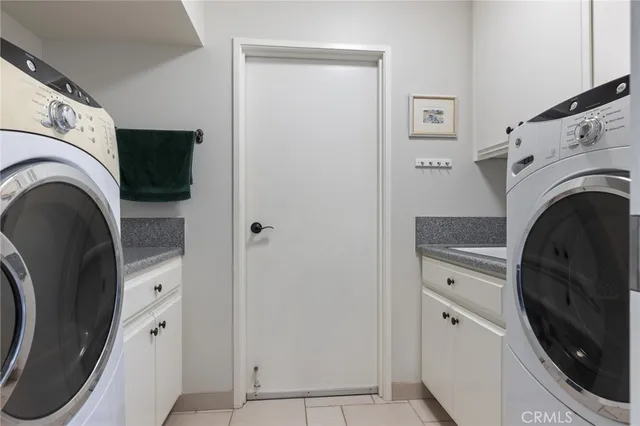 a view of washer and dryer in a utility room