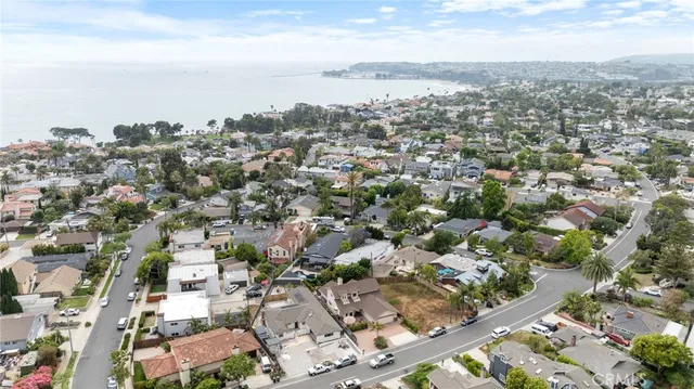 an aerial view of multiple house with yard