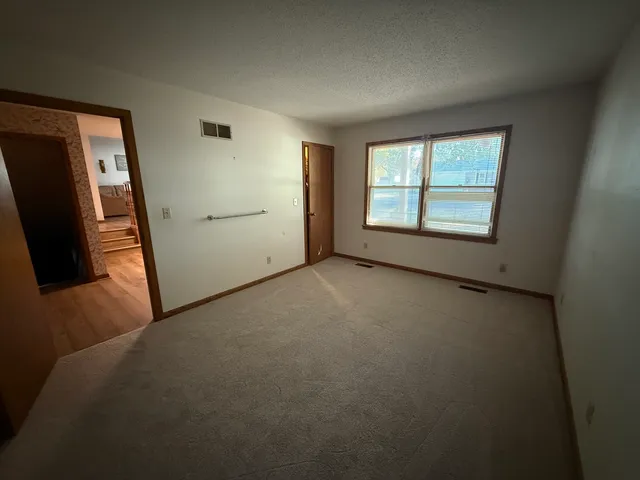 an empty room with windows