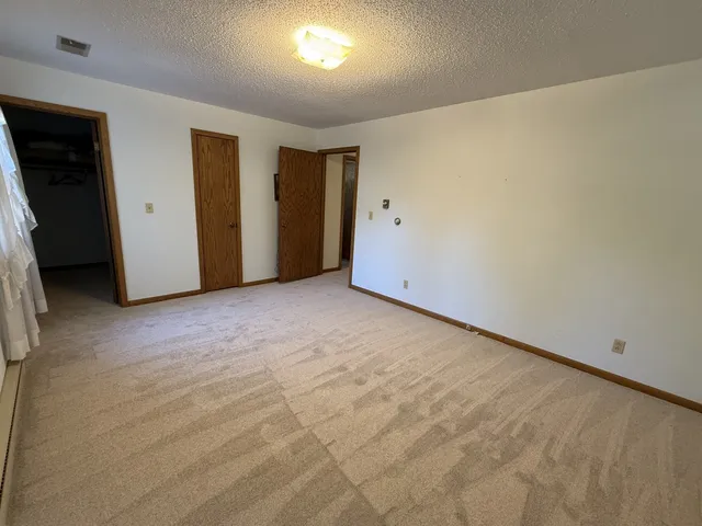 an empty room with closet
