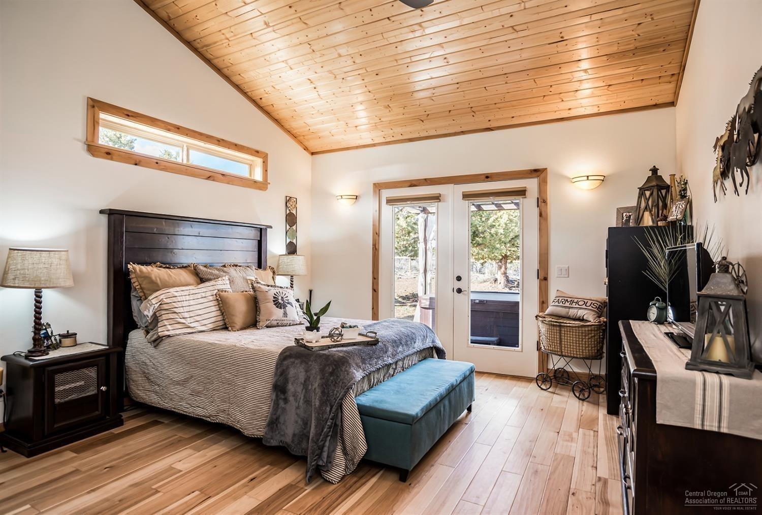 22017 Quebec Court Bend, OR 97702 - Photo 9 of 25 Master bedroom ON MAIN FLOOR with french