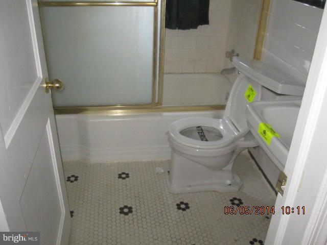 2137 Redthorn Road Baltimore, MD 21220 - Photo 9 of 9 a bathroom with a sink and toilet