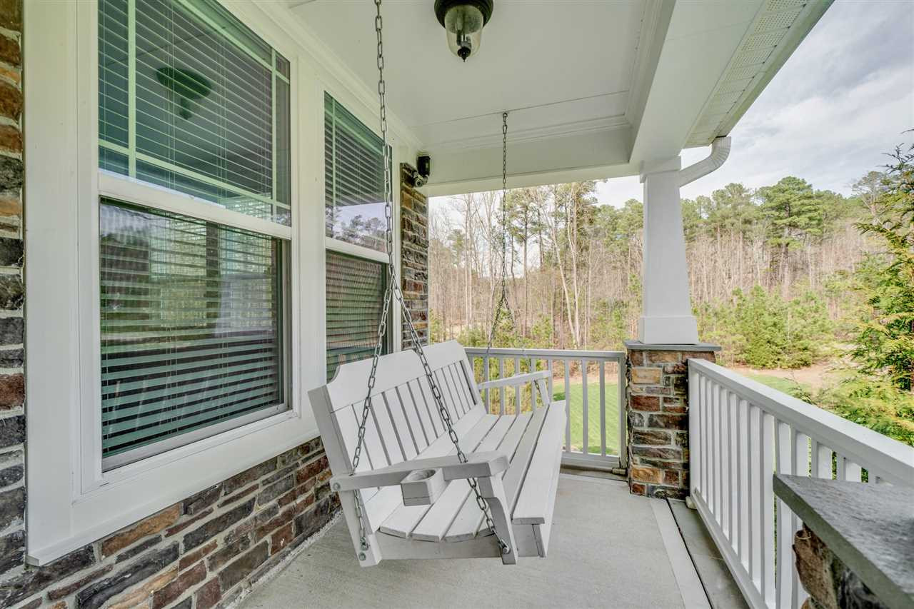 1309 Kintail Drive Raleigh, NC 27613 - Photo 3 of 30 Guardian Home Protection Security system with 3 outdoor cameras w/night vision, 2 week recording option, virtually control front door lock, garage doors, 2 interior lights, thermostats, and fire alarm connected to service Front Porch